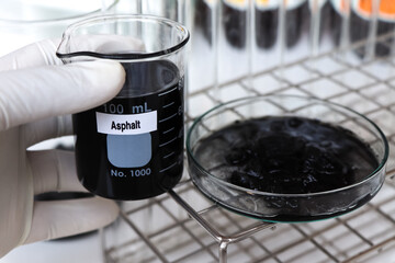 Asphalt in container, Laboratory Quality Testing Concepts