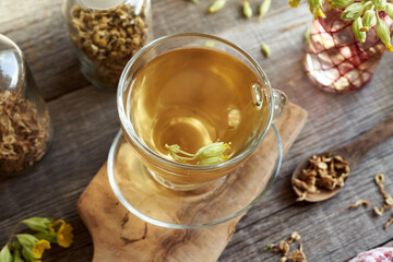 Cowslip or primula tea on a table