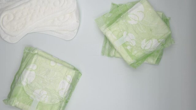 Women intimate hygiene products - sanitary pads on white background. Represent Hygiene concept