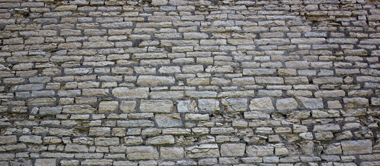 Old brickwork wall. Ancient masonry wall. Antique masonry wall.