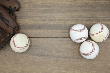baseball glove and balls