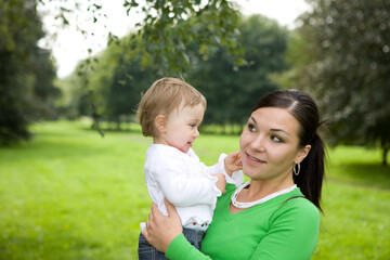 happy family on green meadow