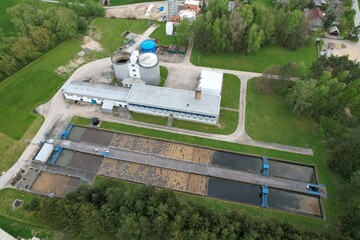 Aerial view of sewage treatment plant, filtration of polluted or waste water. Wastewater treatment...