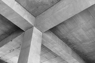 Abstract concrete interior background, ceiling construction with girders