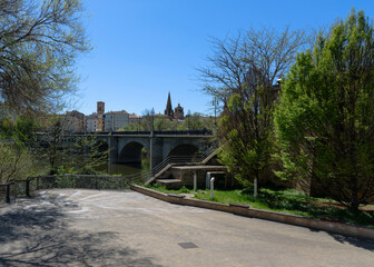 stone bridge, skyline of logrono over ebro river