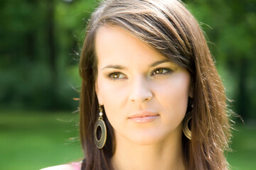 Young Woman On The Green Background