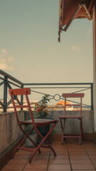 Outdoor terrace with chair and table, vintage filter effect.