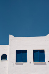 blue windows of the white house greece greek house traditional scenery town 