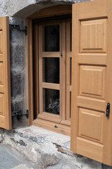 Obraz na płótnie Canvas old wooden shutters window greece Mediterranean town island kos nisyros house door