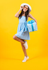 glad birthday woman hold present at studio. birthday woman hold present on background.