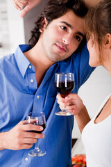 man looking his wife with wine and enjoying his moment