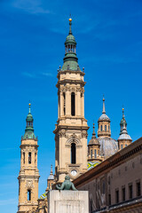 Fototapeta na wymiar Monumental complex of the Basilica del Pilar and historic buildings in the center of Zaragoza, Spain.