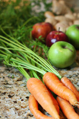 carrots, apples & ginger up close ready to juice