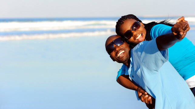 Attractive couple having fun together at the beach