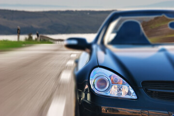 Fototapeta premium Fast Sport Mercedes Car Driving on the Road