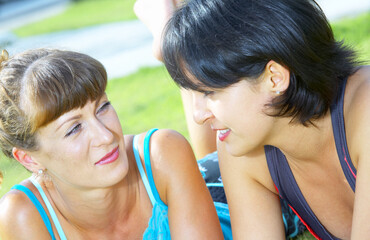 Portrait of two young woman  having fun in summer environment