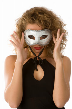 nice portrait of attractive girl with white carnival mask and stunning eyes