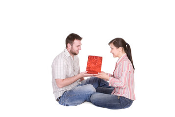 happy young couple together on white background