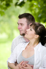 Fototapeta premium happy young couple relaxing in park