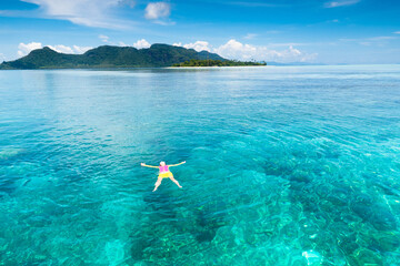 Fototapeta Kids snorkel. Children snorkeling in tropical sea. obraz