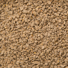 Biofuel, Biofuels, Eco Fuels. Close-Up of the Cat's Litter Box. Filling the Cat Litter Tray. Pet Shop Concept. Products for Pets. Small Brown Pebbles