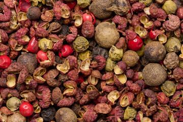 Various mixture of peppers, red, black and allspice. Seasoning for cooking