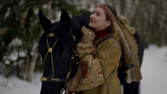traditional russian gown of 12 or 13 century, portrait of beautiful young woman with black horse