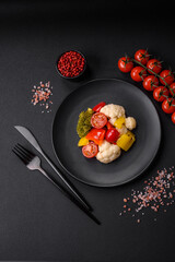 Delicious fresh salad of broccoli, cauliflower, sweet peppers and cherry tomatoes