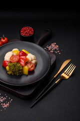 Delicious fresh salad of broccoli, cauliflower, sweet peppers and cherry tomatoes
