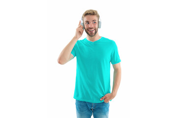 Fototapeta premium smiling man in music headphones at studio. photo of man in music headphones.