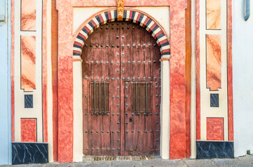 Facade detail of a hermitage in Cordoba, Spain