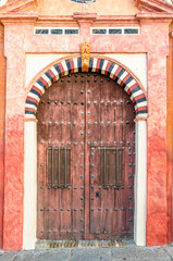 Facade detail of a hermitage in Cordoba, Spain