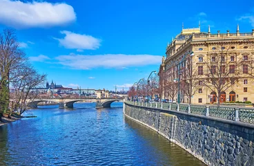 Zelfklevend Fotobehang Masaryk Embankment and Legion Bridge on Vltava River, Prague, Czechia © efesenko
