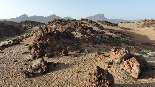 Aerial video at golden hour of Minas de San Jose park with dry Mars like landscape on Tenerife, Spain
