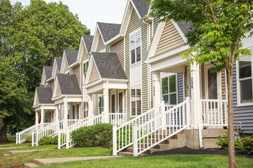 American house suburbs front entrance townhomes symbolize desirable living, investment, and the...