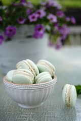 Homemade green macarons with copy space, selective focus
