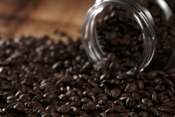 coffee beans in a lying glass