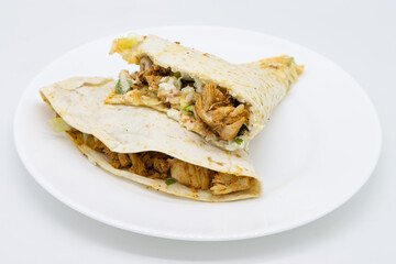 Two Chicken Quesadillas on a White Plate