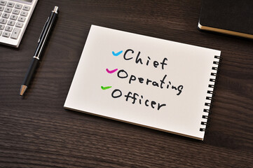There is notebook with the word Chief Operating Officer.It is as an eye-catching image.