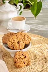 cup of coffee with cookies