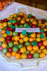 Sweet fruit candy beads in artisan Spanish confectionery shop, english translation: apples