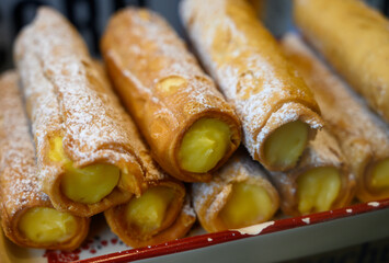 Fresh baked pastries and sweets on display in artisan Spanish confectionery shop