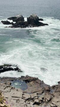 Turbulent sea between Crescent Bay and an offshore island inhabited with shorebirds