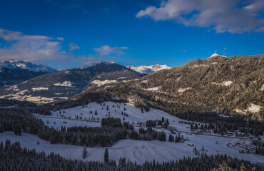 A Mountain valley near Techendorf and lake Weissensee in Carinthia or Karnten, Austria. Panoramic aerial drone picture. January 2022