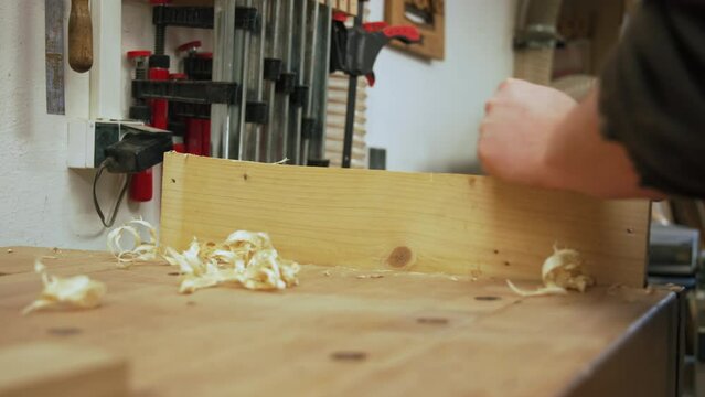 working on wood with a jack plane, the carpenter's tools. High quality 4k footage