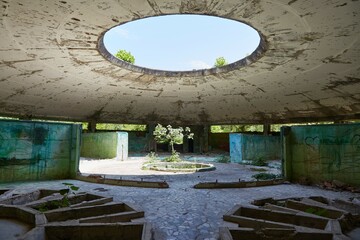 The former Soviet spa town of Tskaltubo in Georgia is now in ruins, and visitors come to explore its abandoned buildings - obrazy, fototapety, plakaty