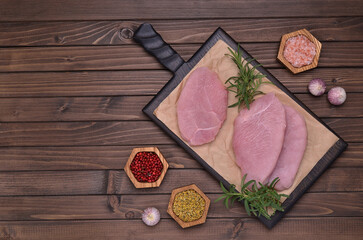 Raw meat fillet with spices