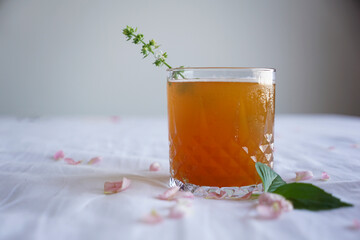 Fresh cold basil and rose infused tea                               