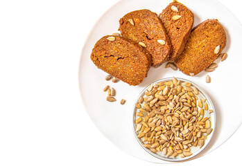 Homemade sunflower halva isolated on white background.