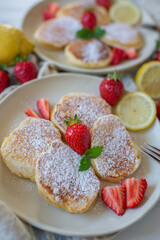 Close-up delicious pancakes, with fresh blueberries, raspberry 